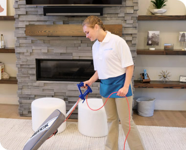 House cleaner vacuuming